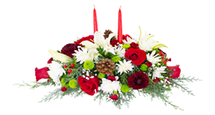 Christmas centerpiece with roses, cushions, carnations and berries for Christmas flowers delivery.